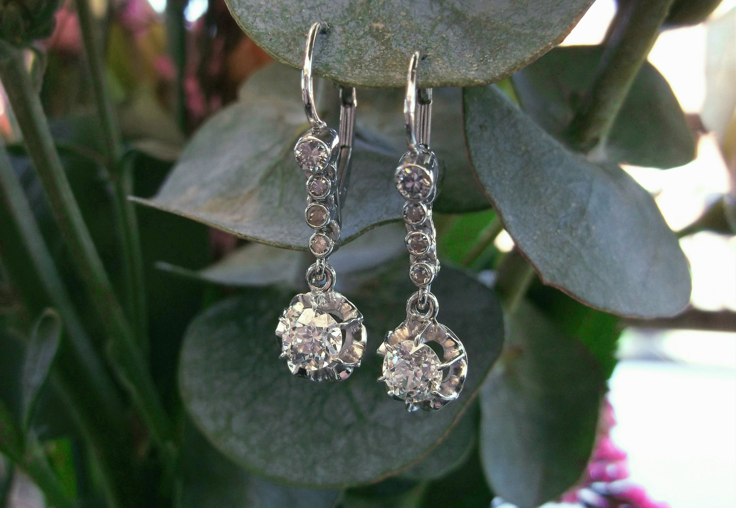 SOLD - A gorgeous addition to any wardrobe! From the 1920's, a pair of Old European cut diamond earrings with 1.00 carats total weight in diamonds set in white gold. 