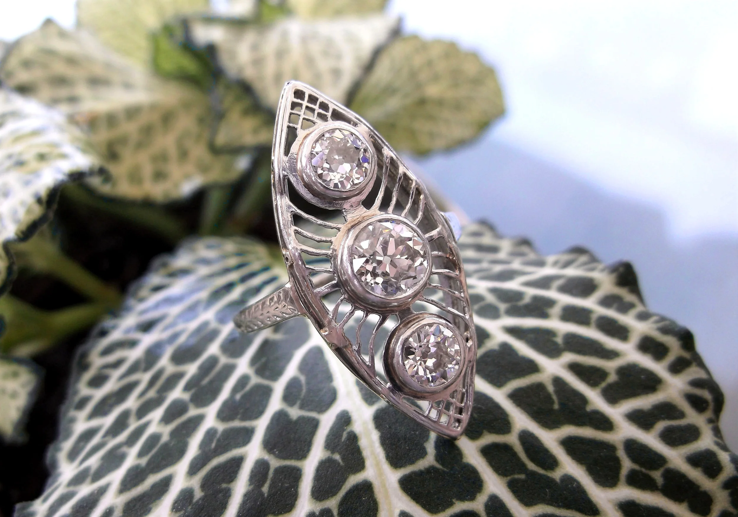 SOLD - Airy and intricate Art Deco Old European cut diamond ring with beautiful white gold filigree details. Shop this ring HERE