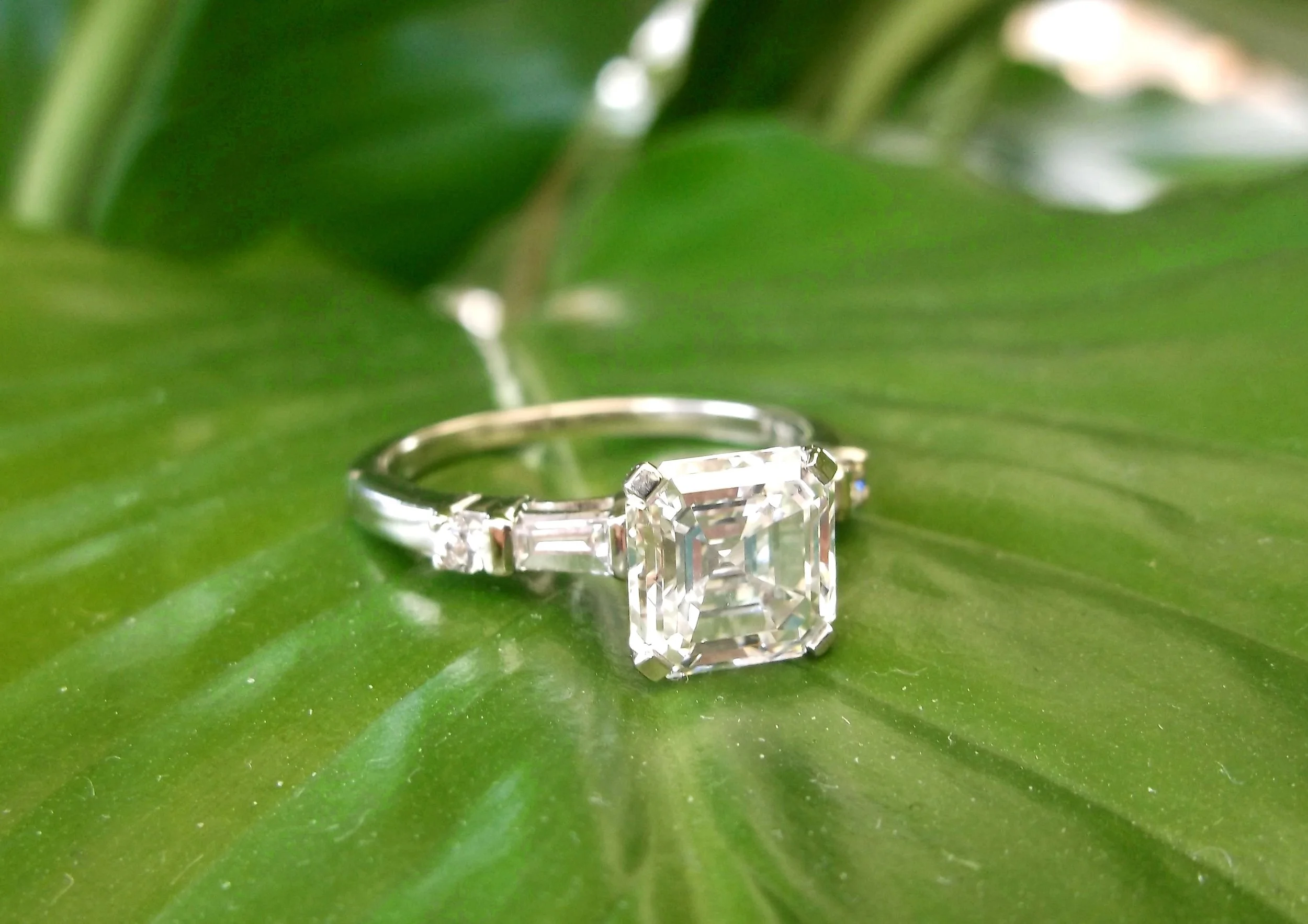 SOLD - Gorgeous 2.54 carat asscher cut diamond ring with beautiful baguette and round cut diamond details. 