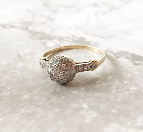 SOLD - Uniquely Edwardian platinum topped gold and diamond ring featuring 0.27 carats total weight in diamonds, set in a fabulous ball shaped cluster mounting. Shop this ring HERE