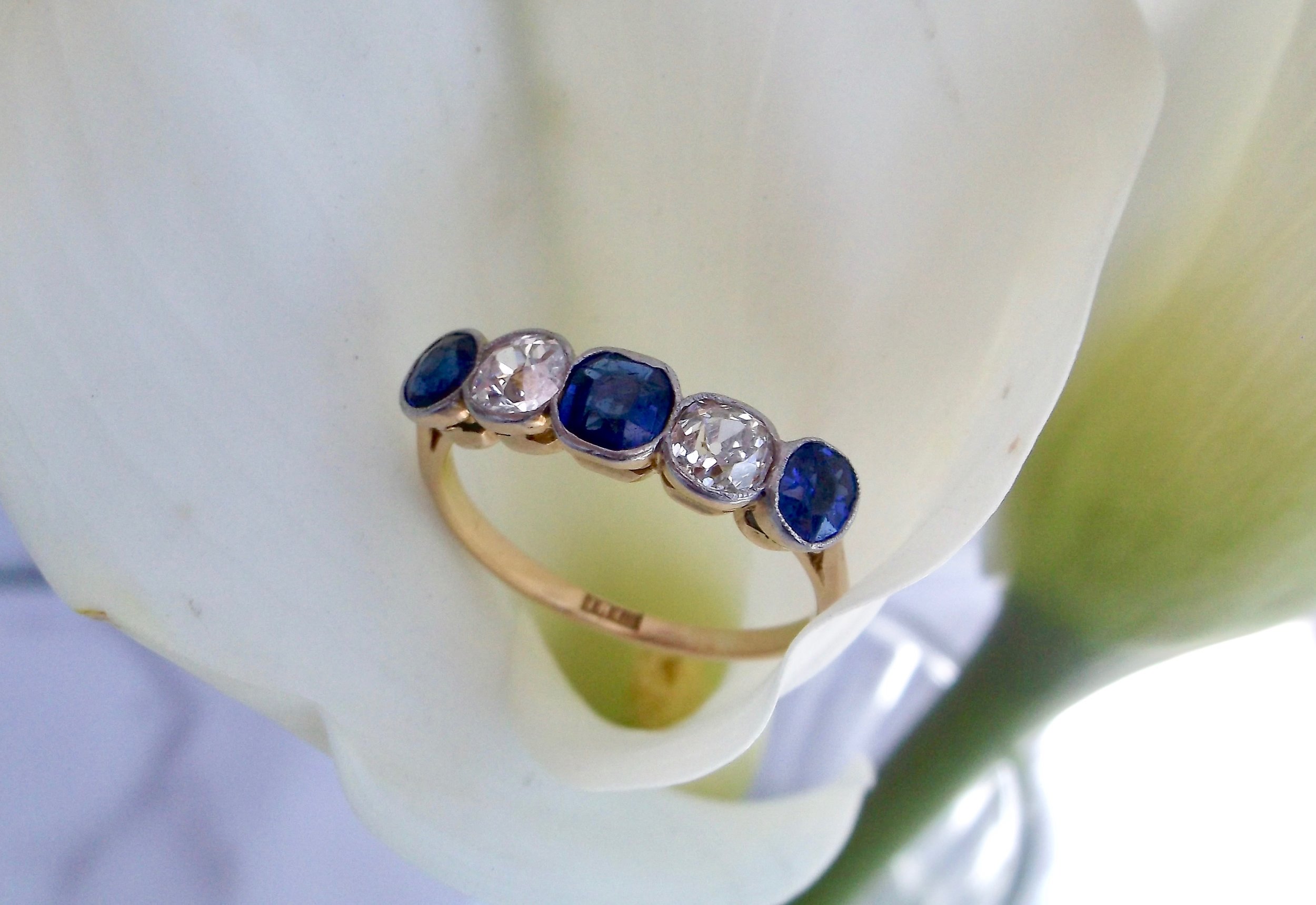 SOLD - Fabulous late Victorian era sapphire and diamond, platinum topped 18K yellow gold band that looks spectacular on its own or paired with other pieces! Shop this look HERE