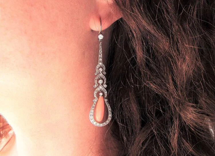 These earrings are what dreams are made of! Elegant Edwardian era, coral and diamond earrings set in platinum. Shop these gorgeous earrings HERE