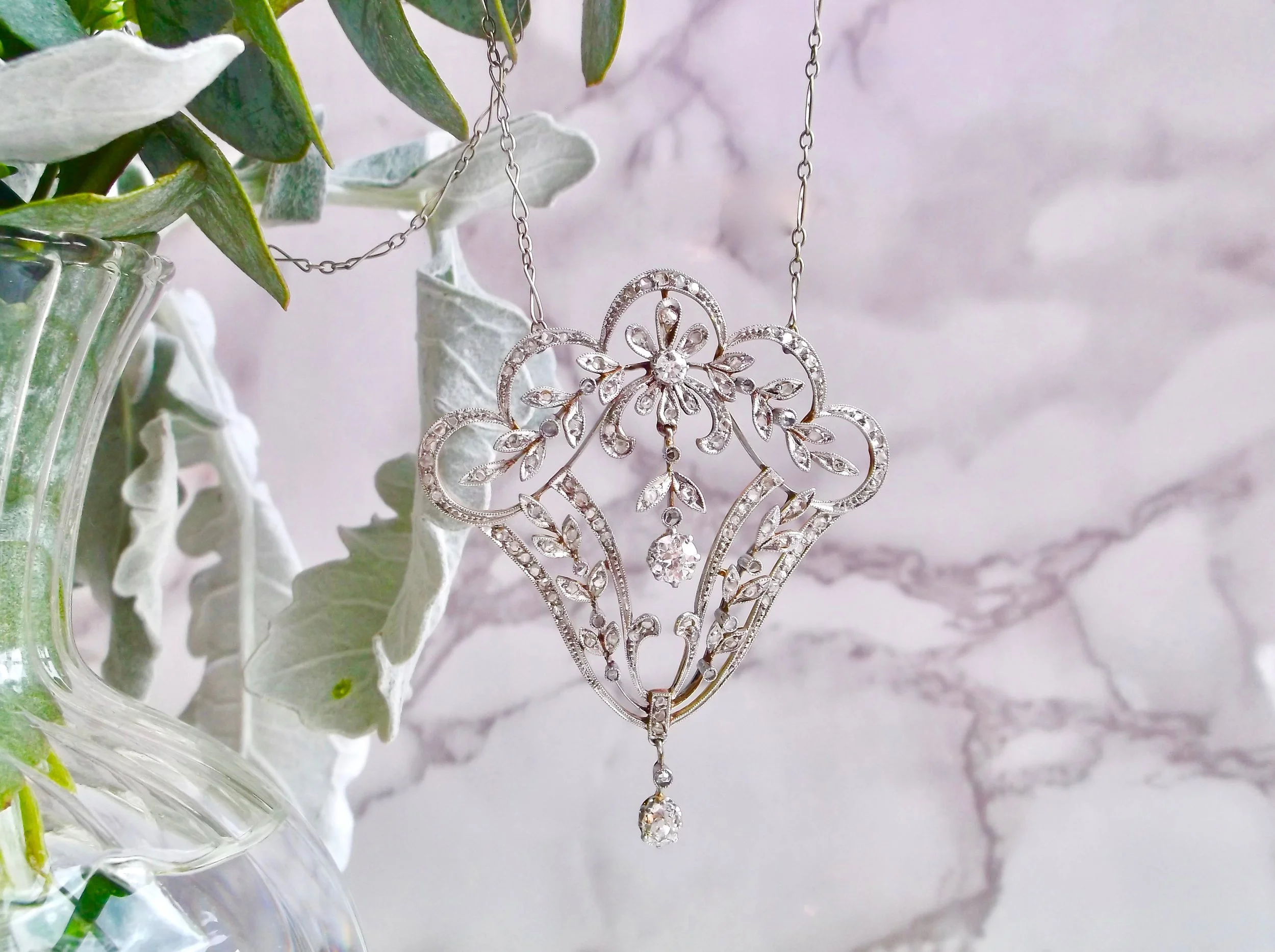 Exquisitely Edwardian, platinum topped 18K yellow gold and diamond necklace from the early 1900's featuring 1.30 carats in Old Mine cut and rose cut diamonds. Shop this beautiful piece HERE