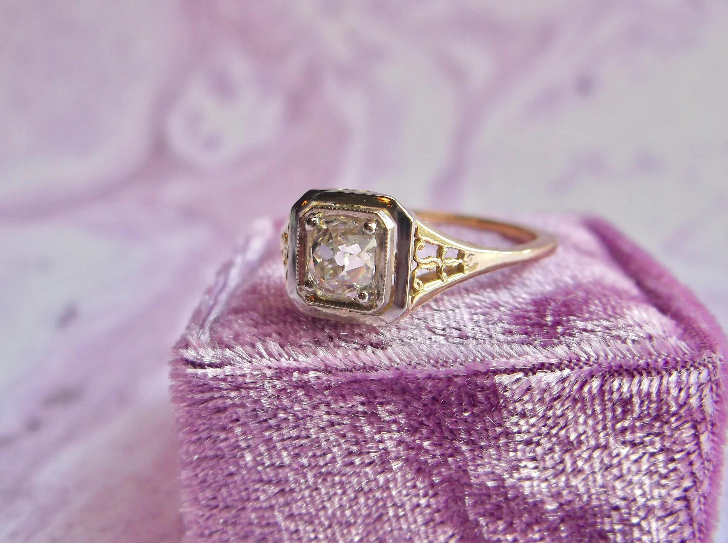 Beautifully timeless Victorian era Old Mine cut diamond ring. The ring features a 0.65 carat Old Mine cut diamond, set in a two tone yellow gold and white gold filigree setting. Shop this beauty HERE . 