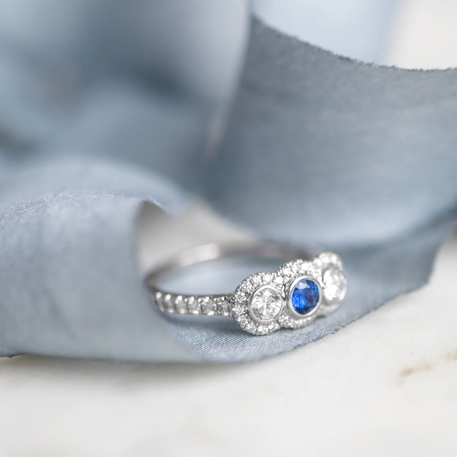 A three stone beauty! Shop this lovely diamond and sapphire ring HERE . 