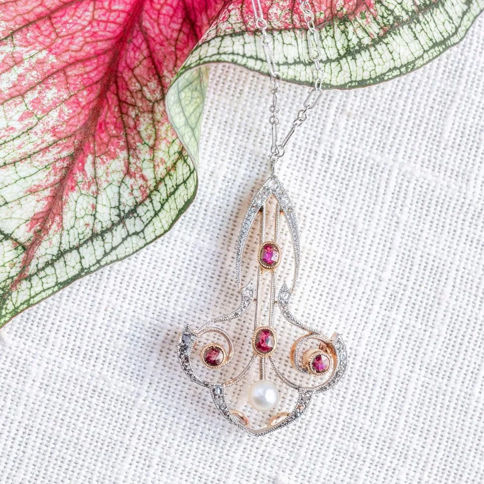 Jucy rubies, glittering rose cut diamonds, and a sweet white pearl set into a gorgeous platinum and yellow gold Edwardian mounting... YES PLEASE! Shop HERE