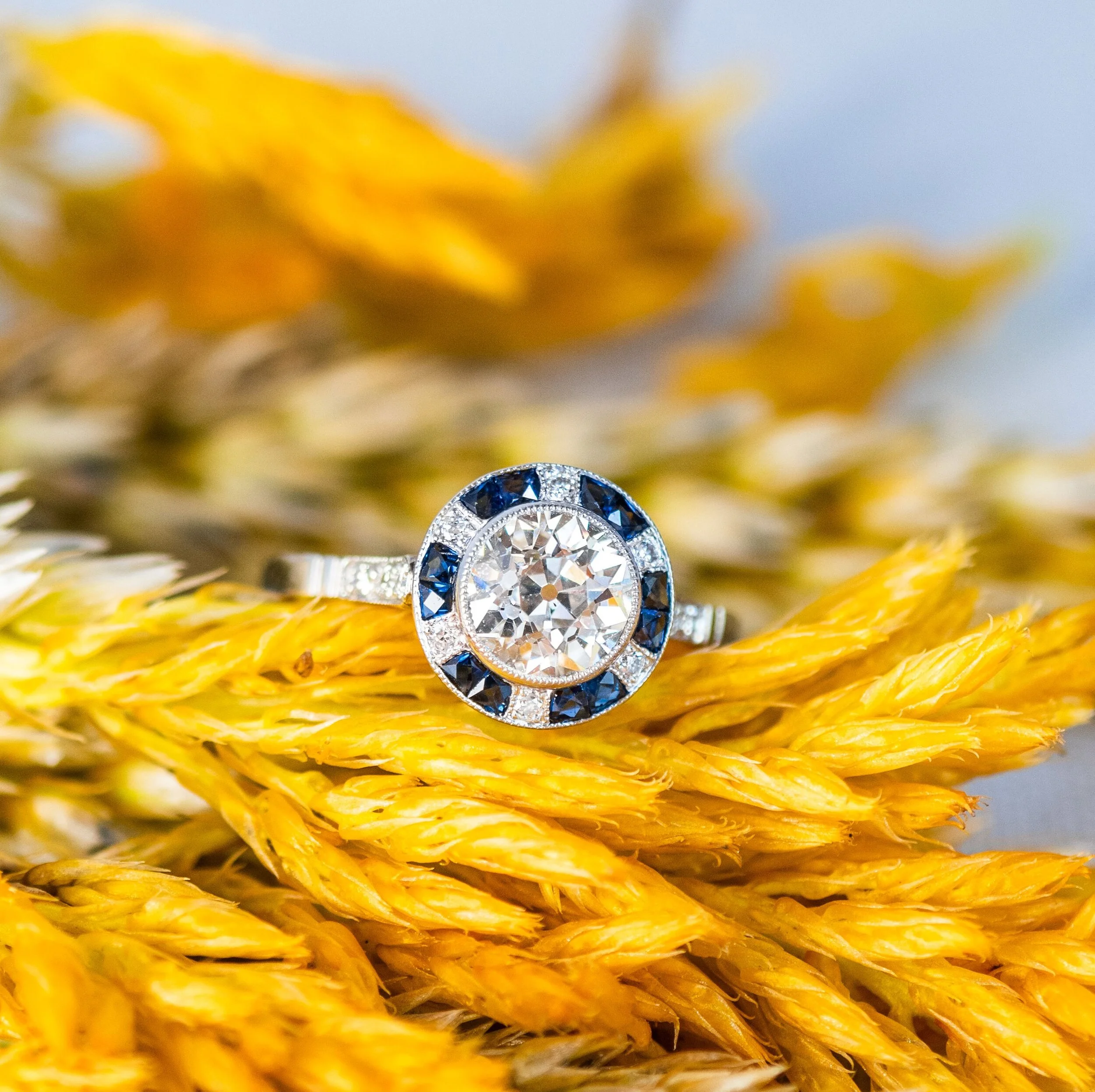 We are weak in the knees from this fabulous 1.37 carat Old European cut diamond accented by the perfect amount of sapphires! Shop HERE .