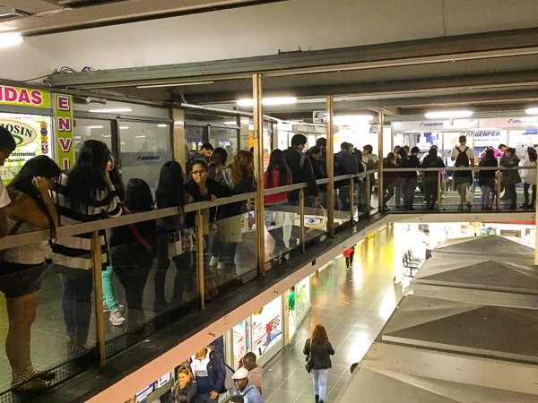 The queue to exchange money for the blue pesos.