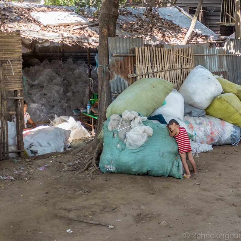 young_child_playing_in_rubbish_circular_train_yangon_myanmar.jpg.jpg