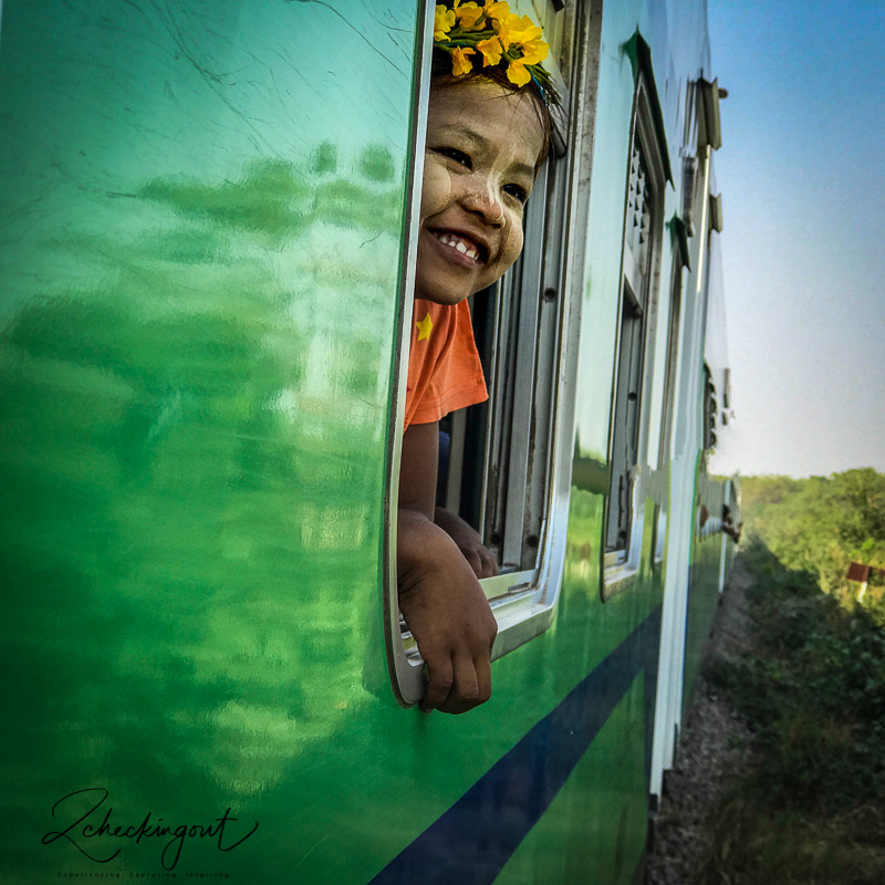 happy_girl_slow_train_myanmar.jpg