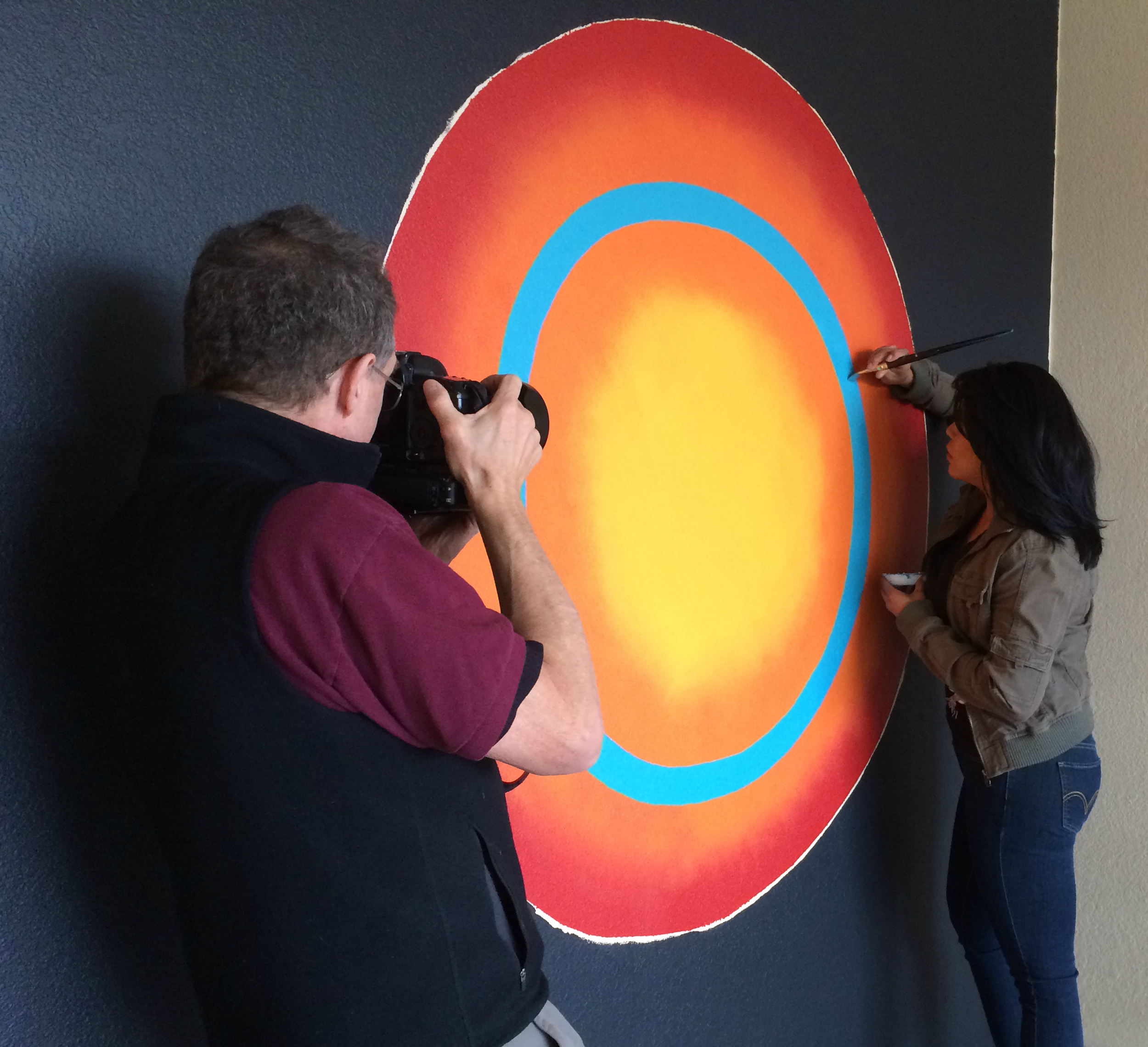 Today I was in the right place at the right time. I witnessed Michelle Lowden working on her Artist Room at Nativo Lodge while being photographed by the masterful Jeff Caven. Michelle will be part of the Open House Reception at Nativo Lodge January 30, 2015 .