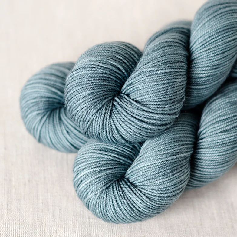 SW Merino Sport - $25 100% Superwash Merino Wool 3 plies 323 yards / 295 meters 100 grams Sport Weight US 1-5 / 2.25-3.75mm Hand wash / Dry flat This base is firmly plied and has a very bouncy, elastic quality. It is soft and smooth.