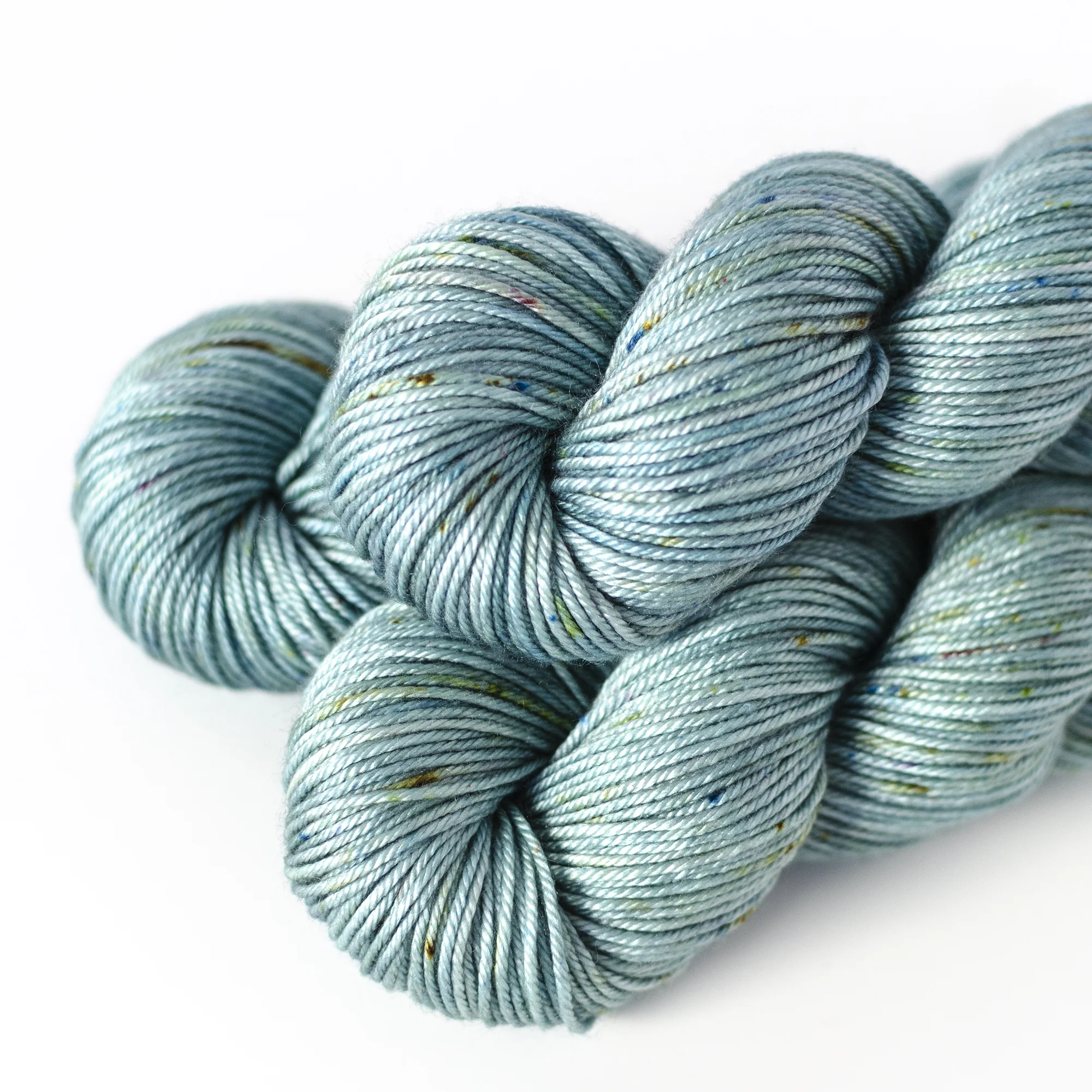 50/50 DK - $32 50% SW Merino Wool, 50% Silk 4 plies 230 yards / 210 meters 100 grams DK Weight US 5-7 / 3.75-4.5mm Hand wash / Dry flat This DK weight yarn is soft and smooth with excellent drape.