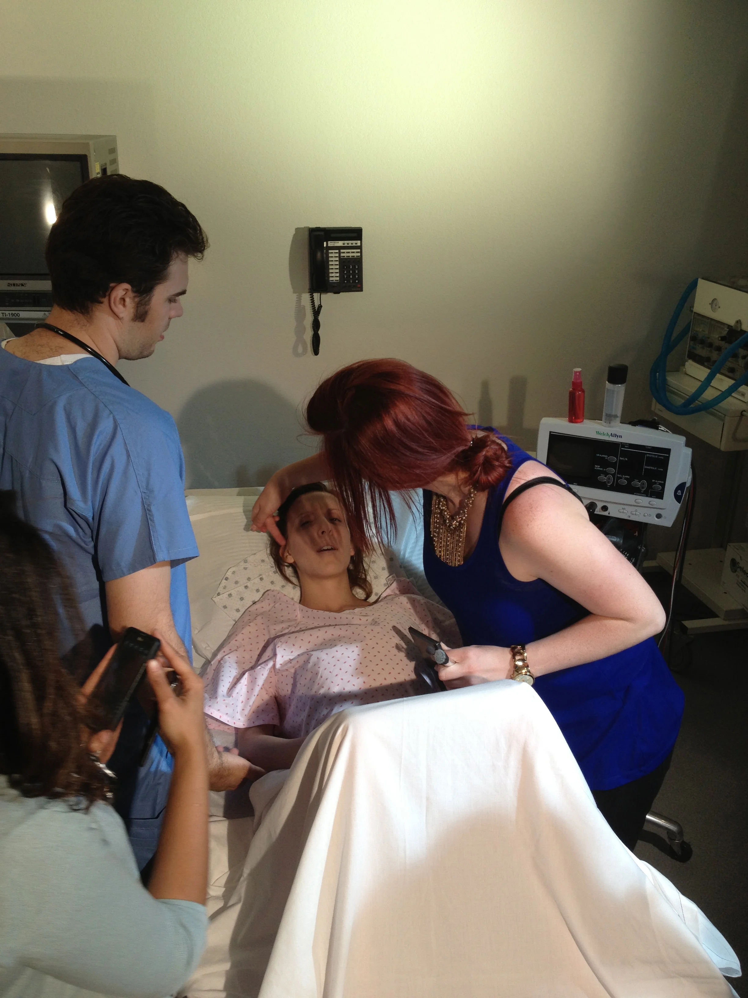 Makeup Artist Amber Morgan gets the multi-talented director ready for an intense delivery scene.&nbsp;