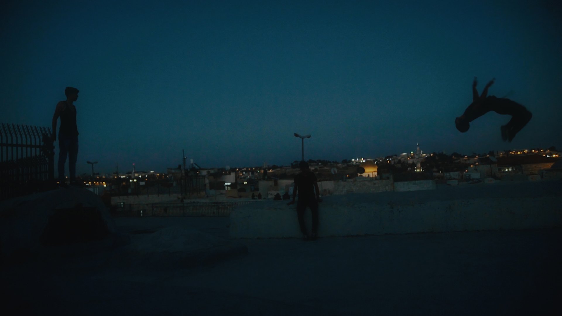 Members of the Jerusalem Parkour Team practice on the rooftops of the Old City in Jerusalem. Courtesy: Hurdle
