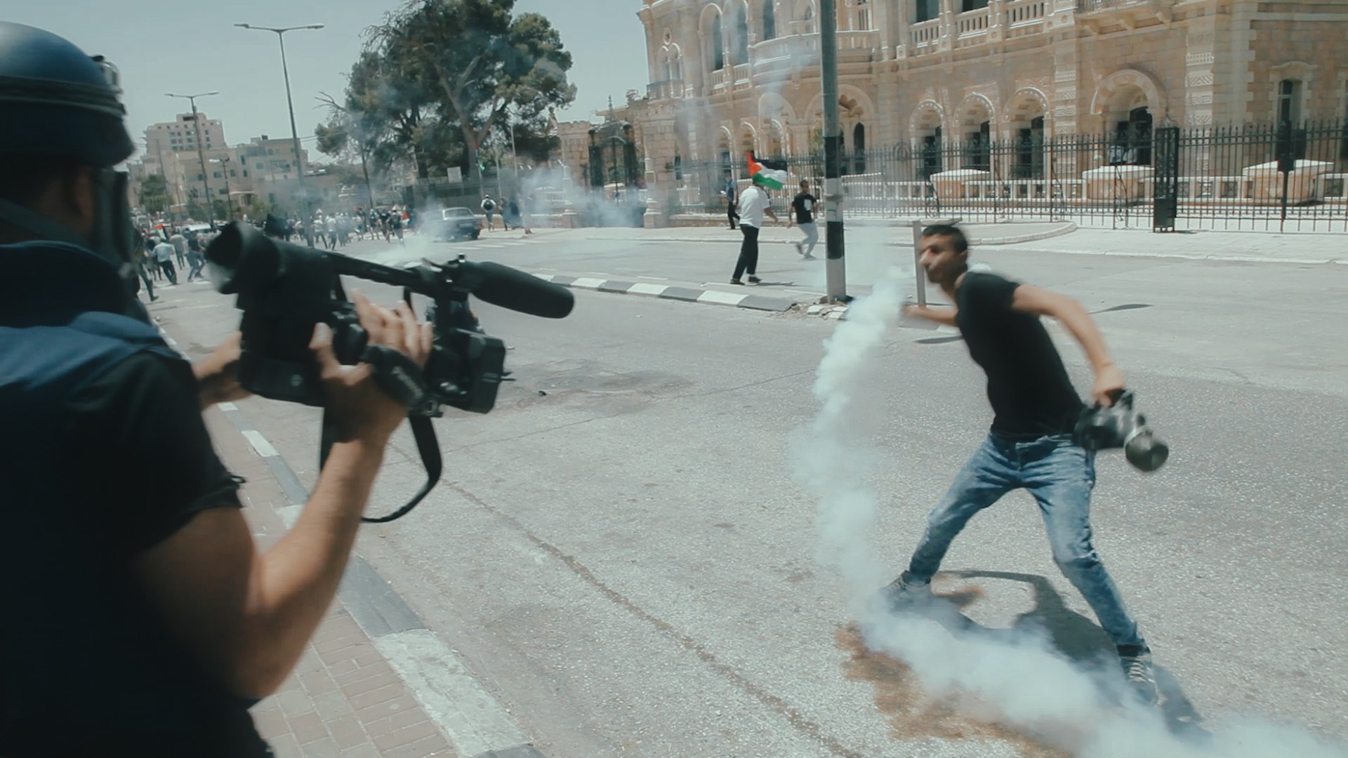 Clashes in Bethlehem as Mohammad Alazza (left) films. Courtesy: Hurdle