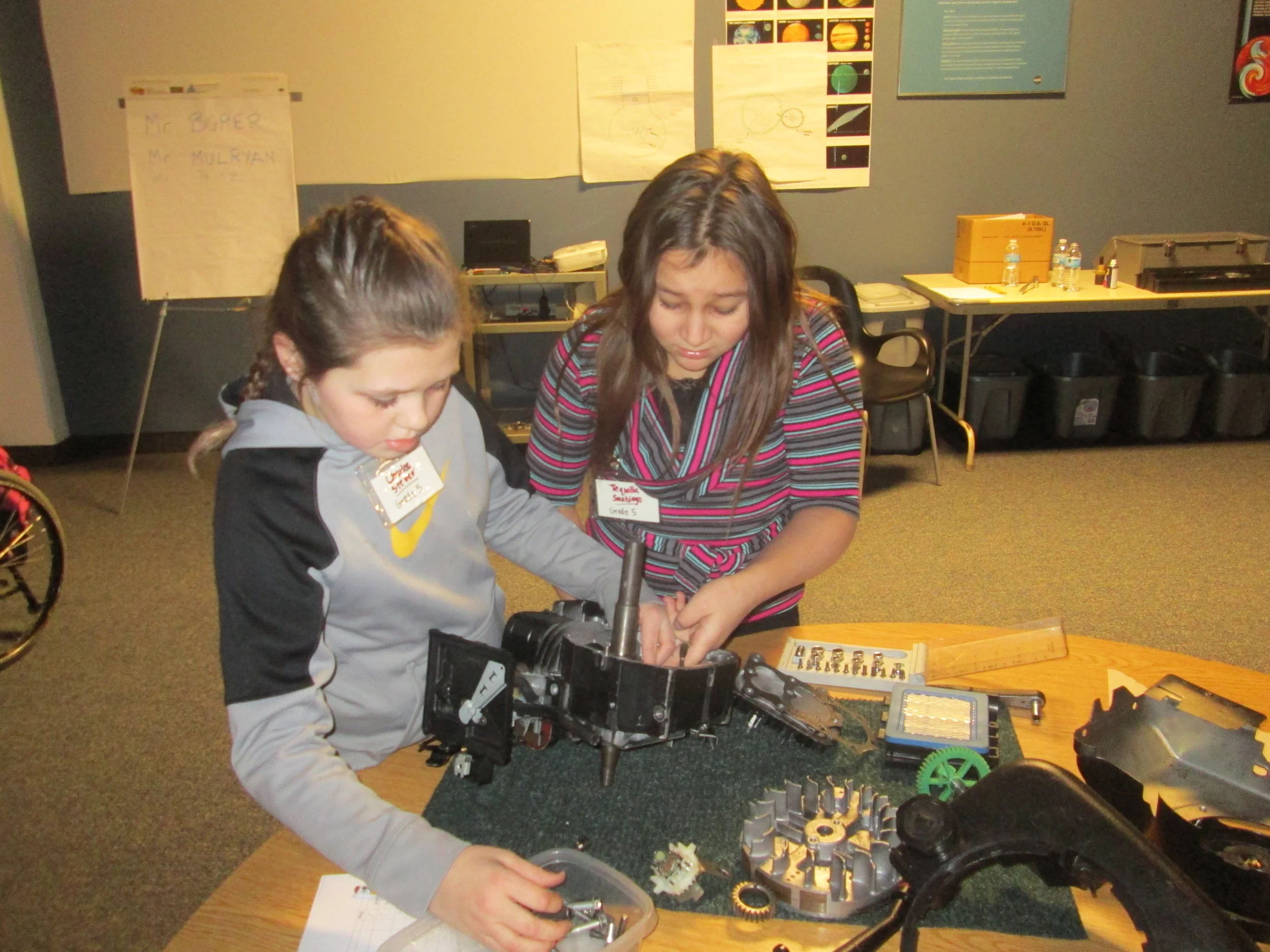Students from Canisteo-Greenwood after school program working on their engine.