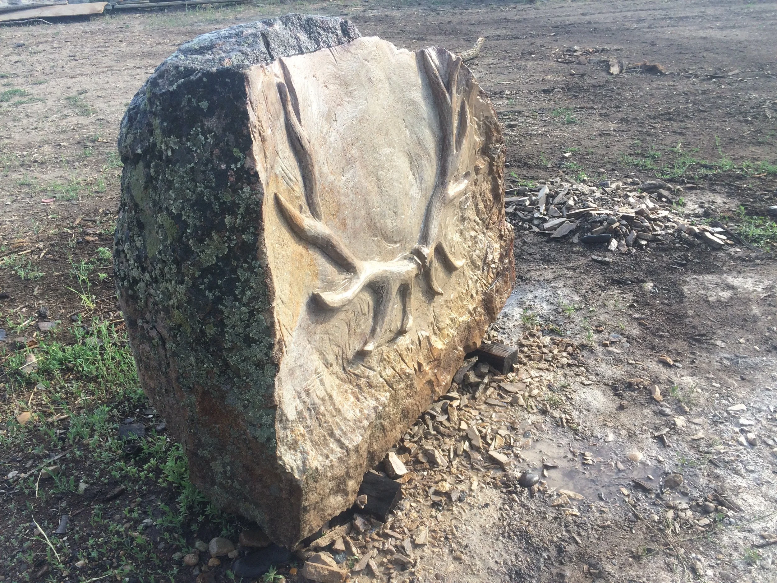 CHris sculpted an elk rack out of this beautiful sandstone / granite rock for a client’s family memorial headstone.