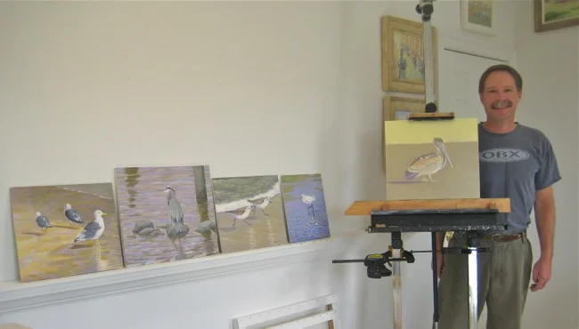 In the studio with his bird paintings!