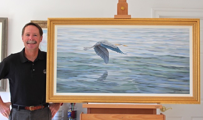 William R. Beebe in his studio in Virginia alongside a commissioned painting in 2015