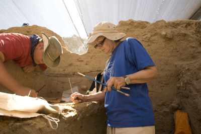 Larry Largent and Shelby White excavating a Bronze Age burial