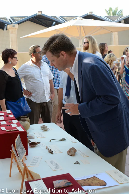 Co-Director Daniel Master examines some of the finds of the season