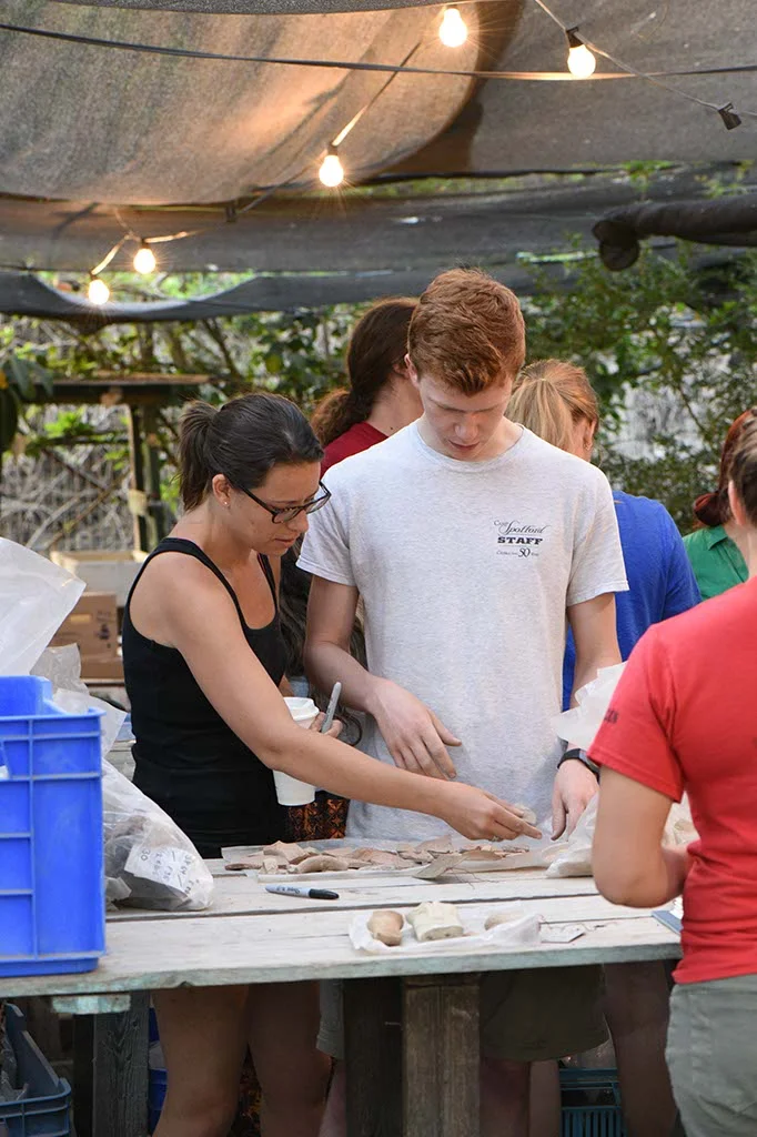 Robyn identifies a bag of pottery
