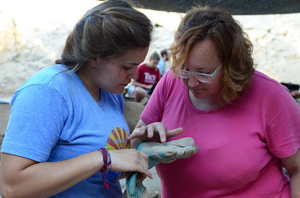Laura examines a possible artifact