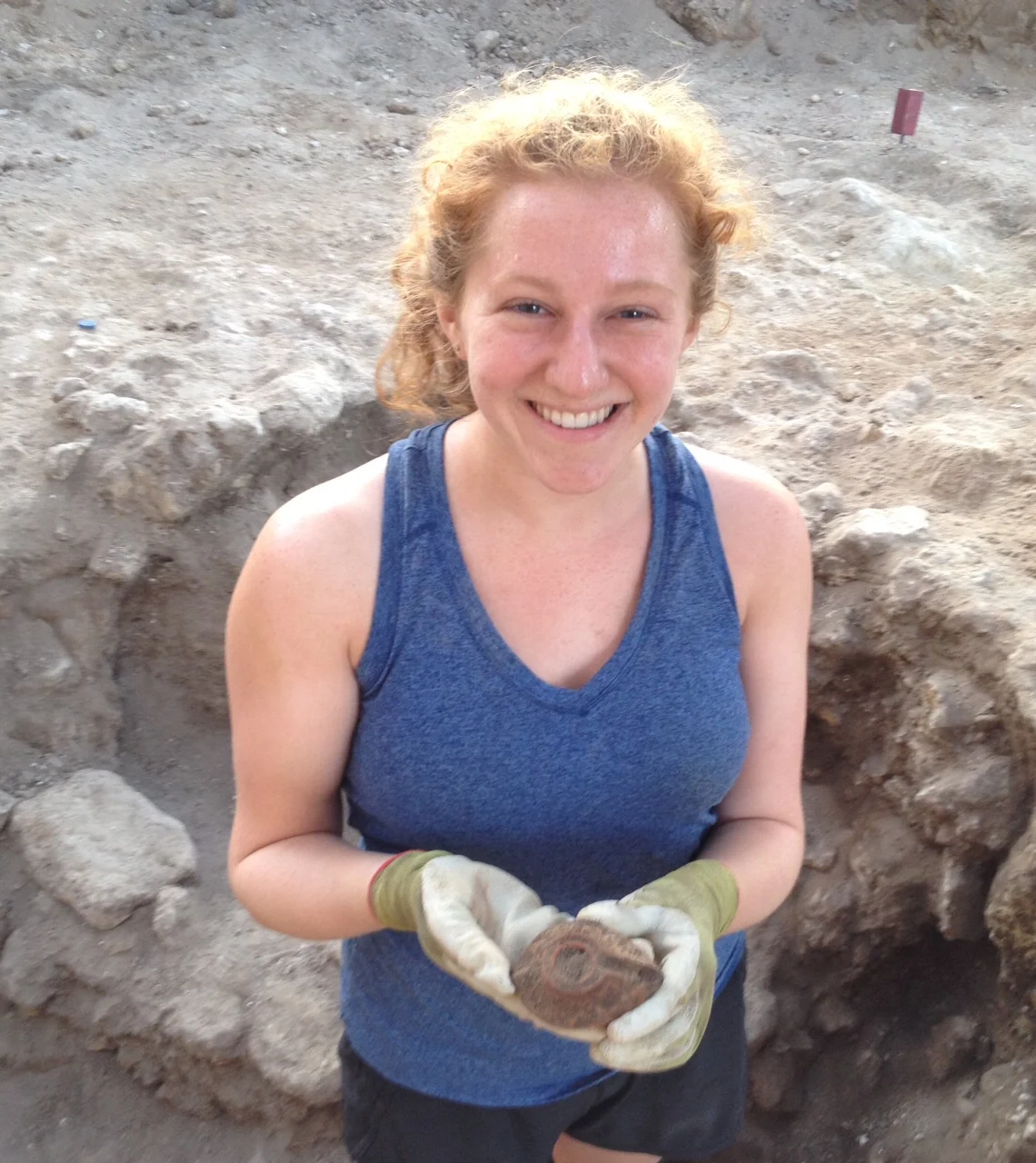 Miranda and the oil lamp she found while excavating a sewer