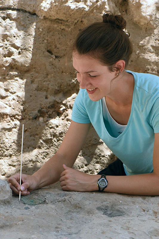 Weight plate being excavated in Grid 51