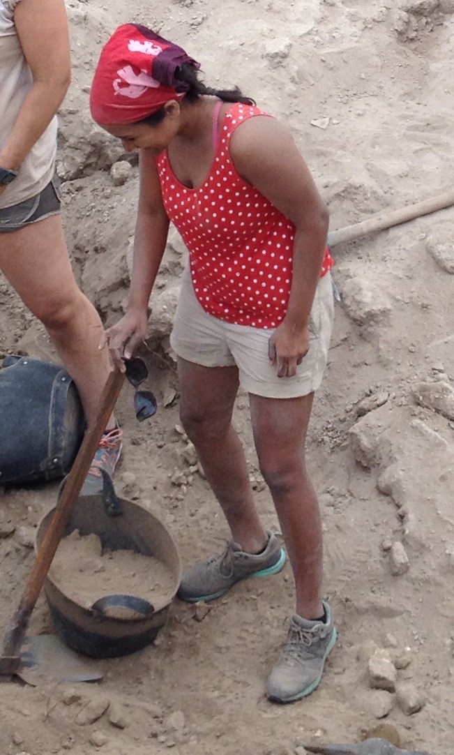 Sarani fills a guffah with dirt