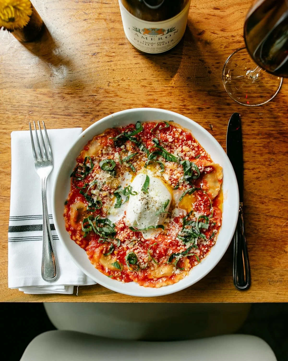 π A perfectly Portland fall day. Sunny, crisp, and calling for comfort.
Settle in with a plate of tomato basil ravioli, a glass of red wine or maybe our Fall Pear Mule, and finish with our creamy banana pudding.
The kind of meal tha