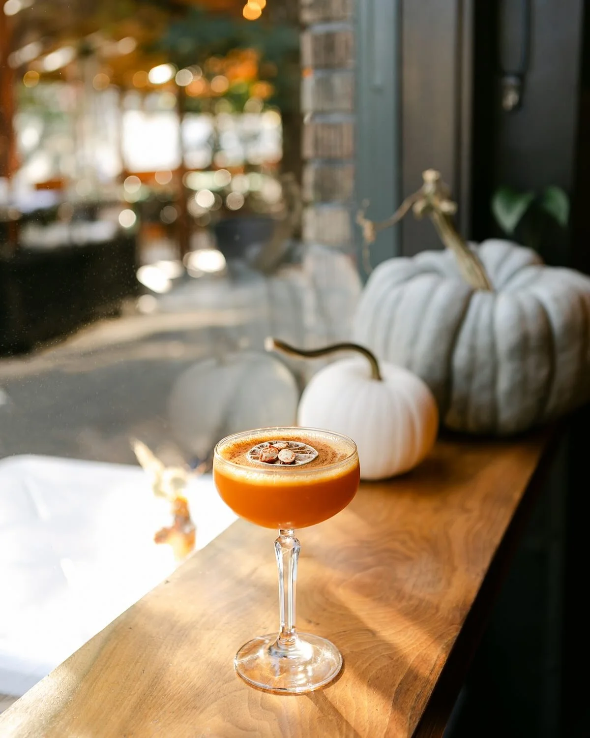 Let’s welcome in “HELLO, GOURD-JUICE!” to our line-up of fall cocktails! ππ₯
A comforting blend of Appleton Estate and Smith & Cross Rum, Allspice Dram, butternut squash juice, a sprinkle of Demerara cinnamon & n