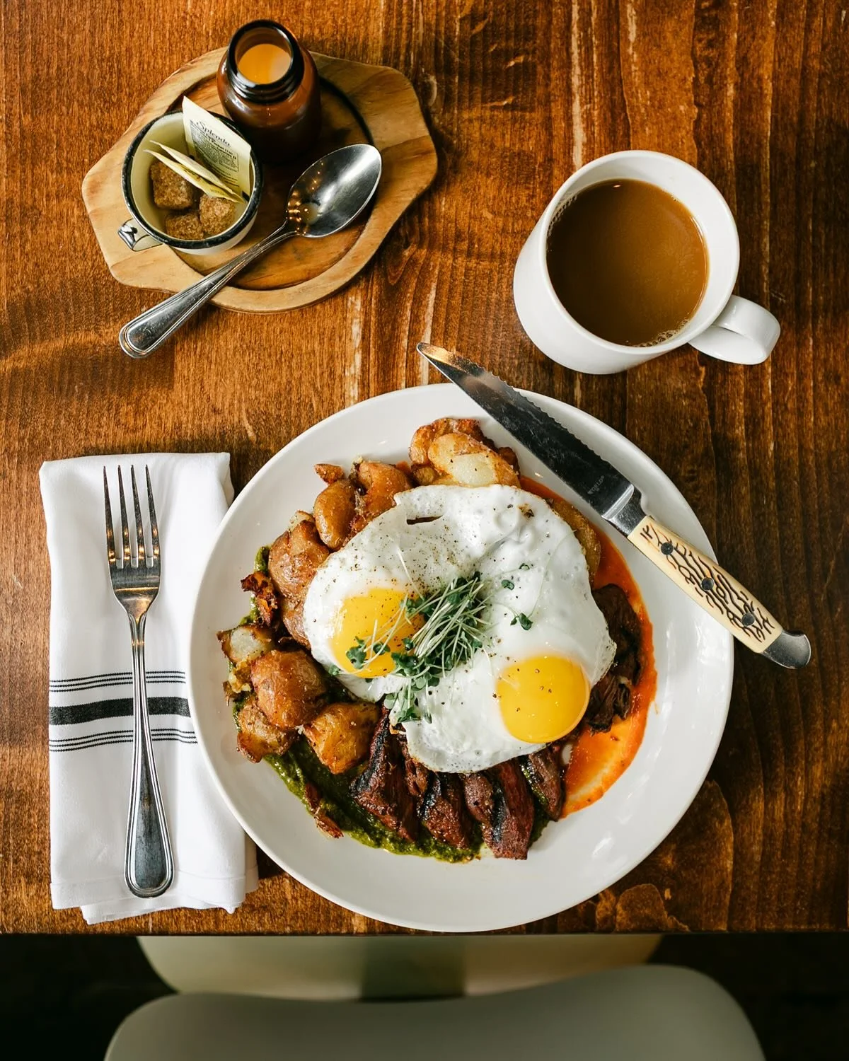 ππ¨ Blustery outside, cozy inside.
We’re keeping warm by the fire and filling up with our Fireside Steak & Eggs: Grilled hanger steak, two eggs sunnyside-up, smashed potatoes, and red & green chimichurri.
Add a cup of Spella Caff&egra