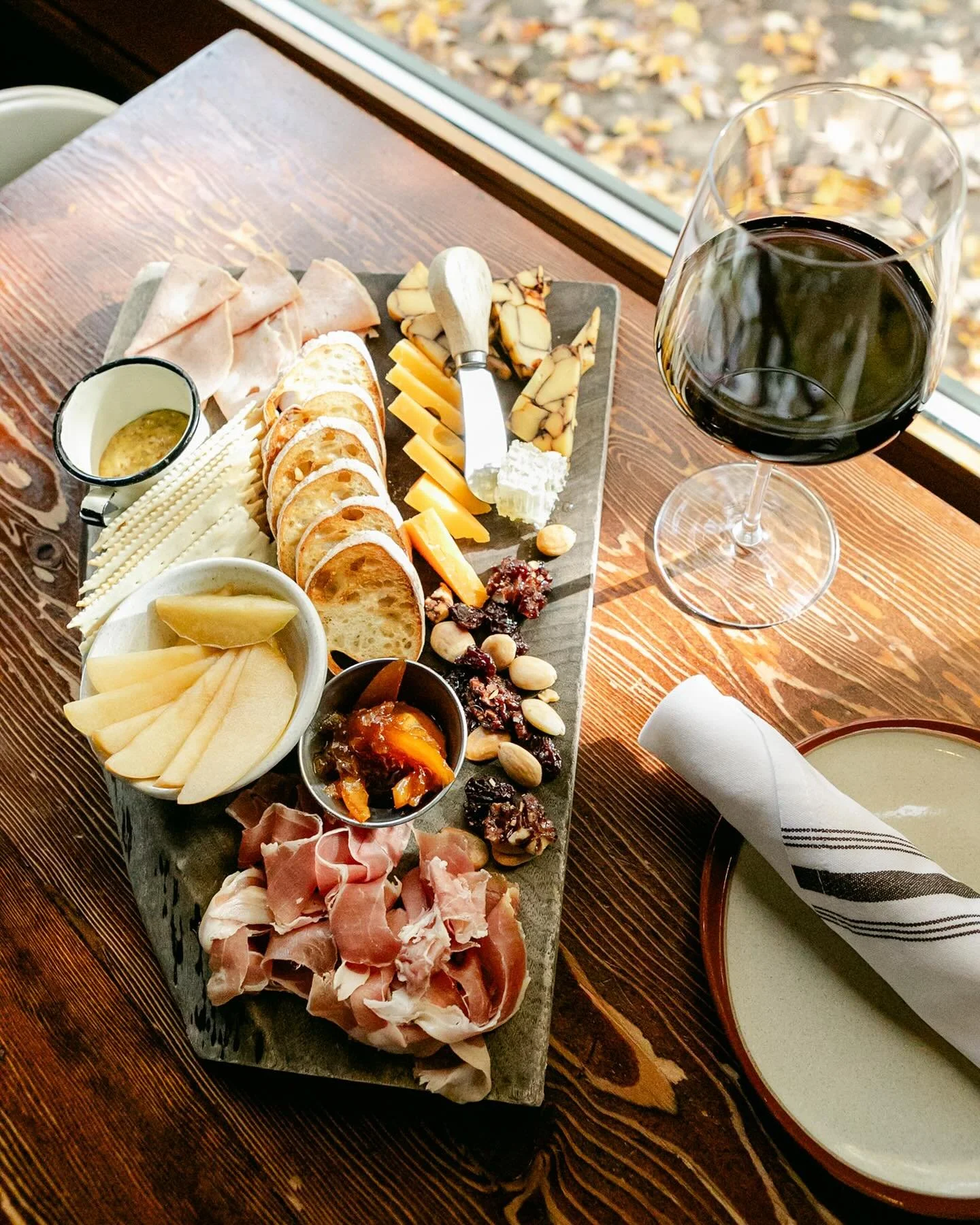 FALL HAS ARRIVED ON OUR CHARCUTERIE BOARD 🍂🧀
We&rsquo;ve refreshed our board with the rich, warming flavors of autumn. 

The Lineup:&nbsp;14-month Prosciutto Italiano with centuries of Italian tradition in every slice, Olympia Provisions Mortadella