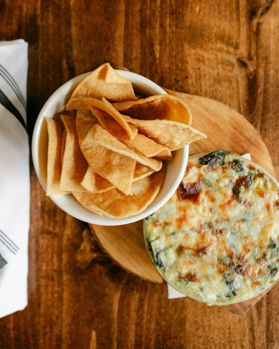🔥 Served hot and made for sharing! Our&nbsp;SPINACH ARTICHOKE DIP&nbsp;is generously filled with spinach, artichokes, and melty cheese, paired with house-made tortilla chips and plenty of reasons to linger a little longer at the table.

#PDXFireside