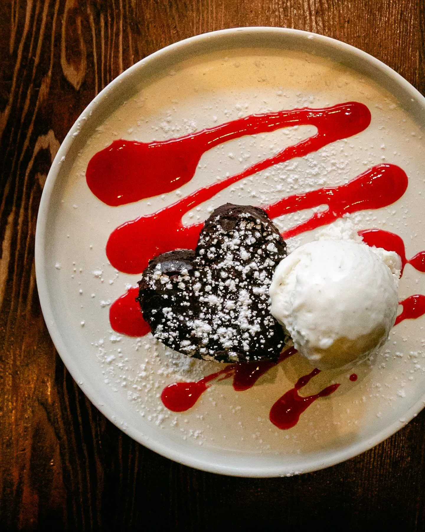 Valentine&rsquo;s Weekend calls for something decadent. ❤️

Our Valentine&rsquo;s dessert is a&nbsp;flourless chocolate brownie&nbsp;topped with raspberry coulis, vanilla ice cream, and whipped cream. 

Rich, indulgent, and made to end the night on a
