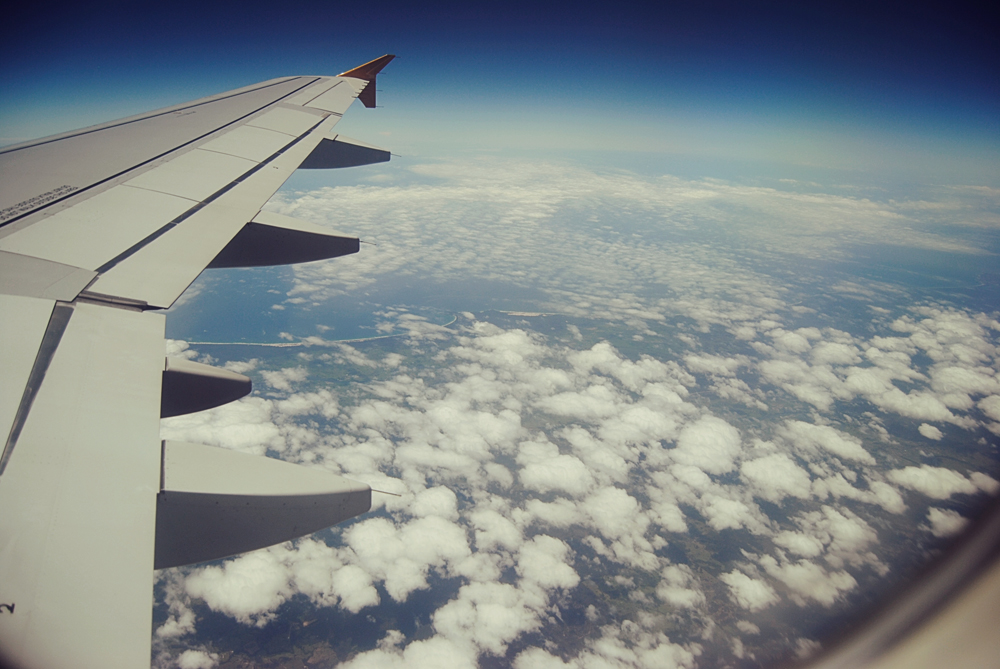 flying over clouds