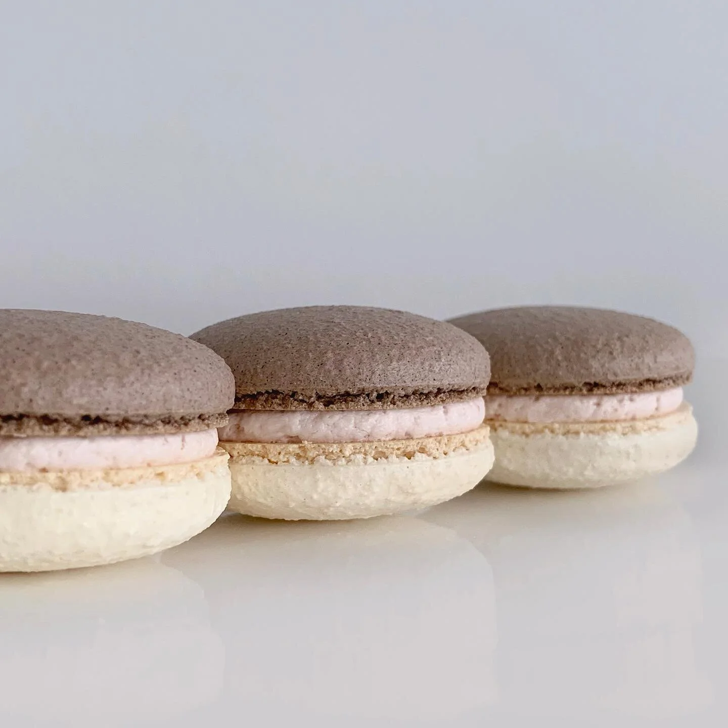 chocolate shells + vanilla shells x strawberry marshmallow buttercream 
.
.
Occasionally, when you haven&rsquo;t had a wonky batch of macs in a while, they&rsquo;ll show up to say hello and make you want to cry. Just kidding about the crying. Maybe. 