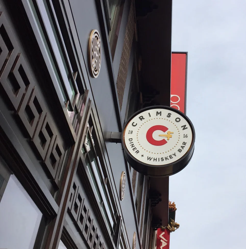 Crimson Logo Design Applied to exterior signage for the pod dc hotel . Signage by NeonFiveDesign.com.