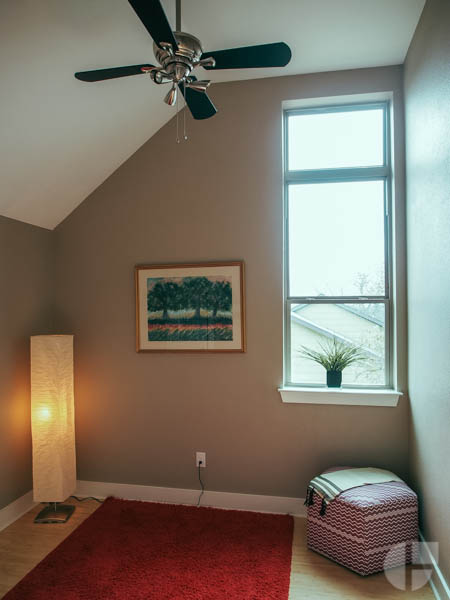 The upstairs has two small bedrooms, one with a full bathroom, and another covered patio. This one with city views. 