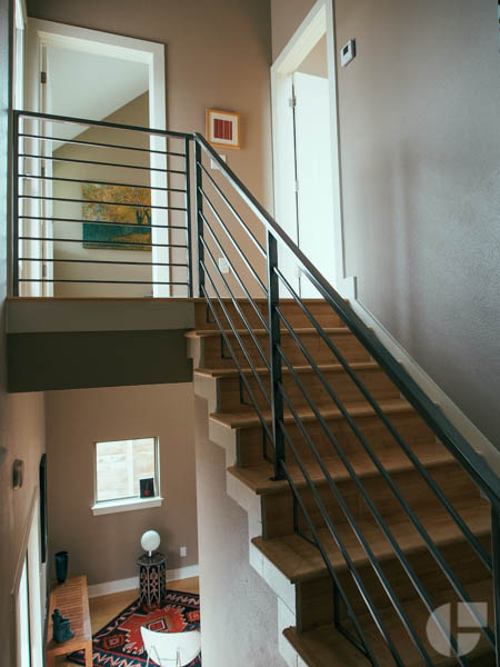  The upstairs has two small bedrooms, one with a full bathroom, and another covered patio. This one with city views.&nbsp; 