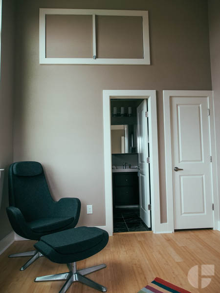 The upstairs has two small bedrooms, one with a full bathroom, and another covered patio. This one with city views. 
