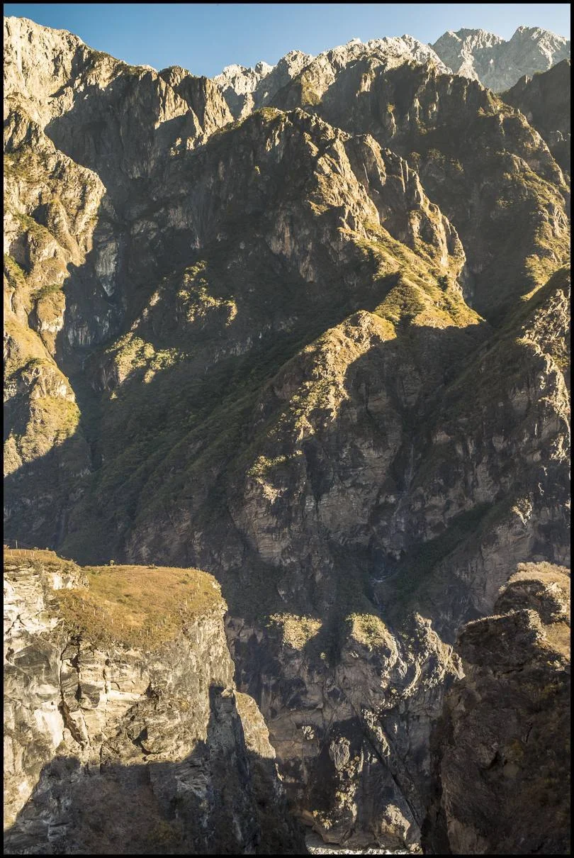 Plateaus and terraces create growing climate for farmers within the shadow of these mountains along the border of Tibet and China.