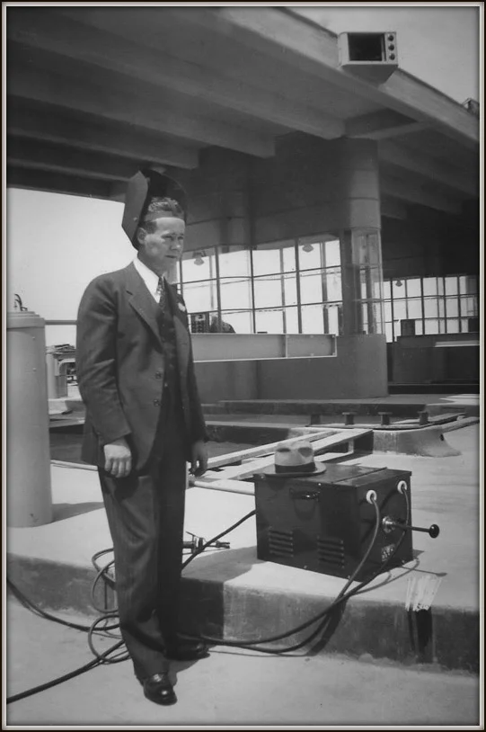Clyde demonstrating a welding machine on the Bay Bridge in 1937