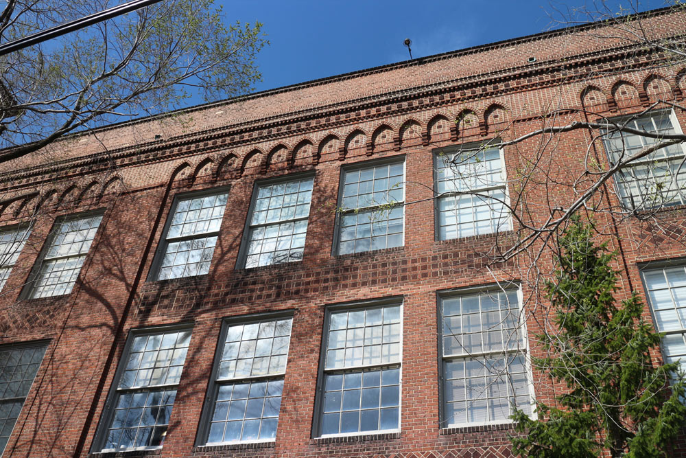 Exterior view of Condo #301. (Upper four windows.)