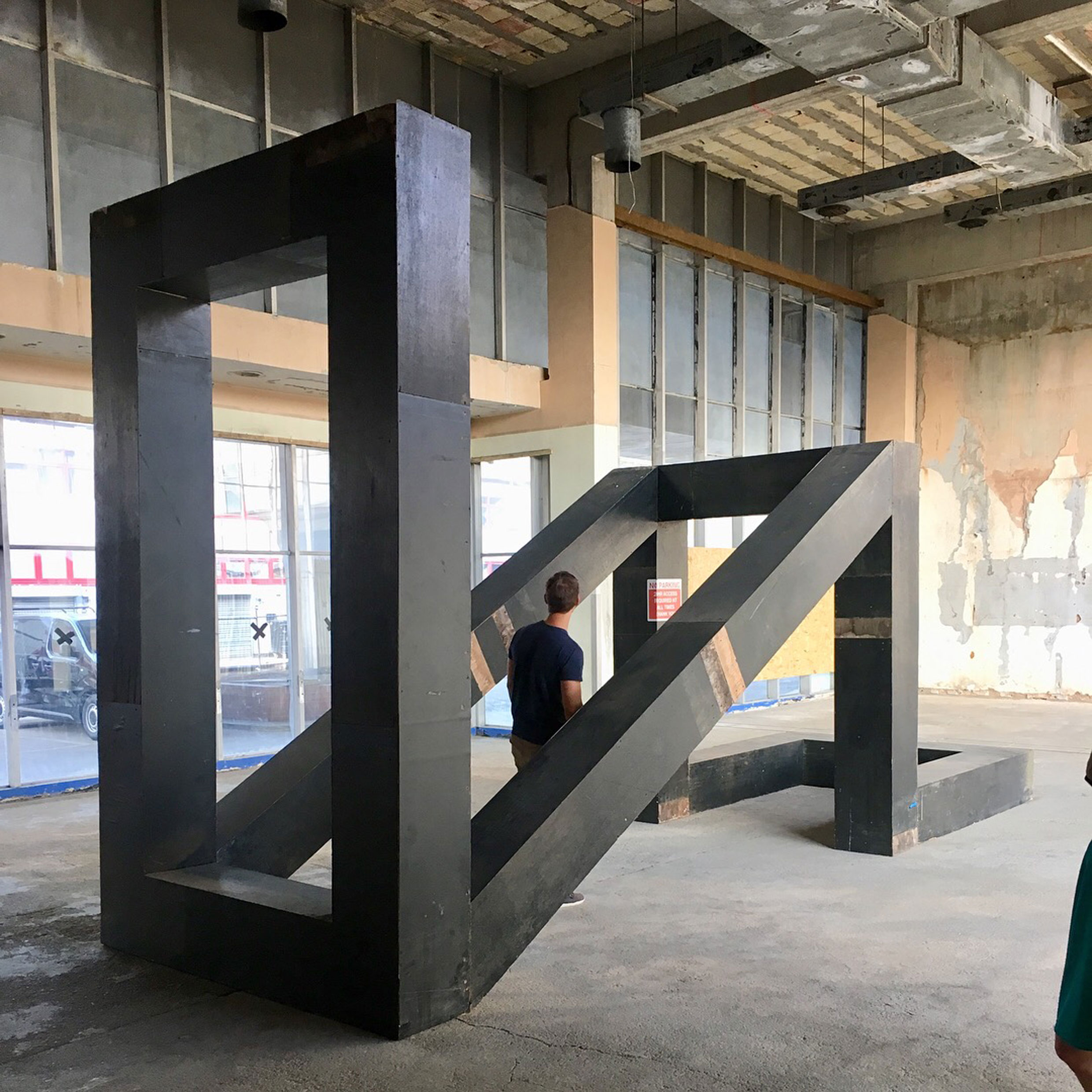 Primitive Plus. sculpture from found wooden hoardings. The Silver Building London 2018