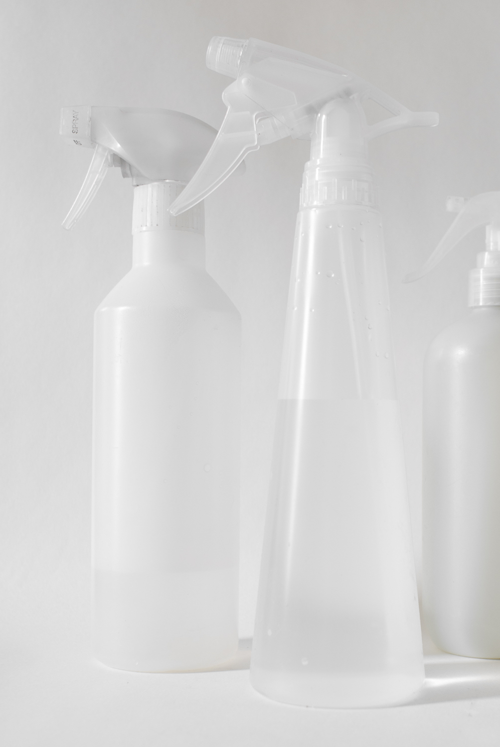 From left: my favorite trusty old sprayer from Muji; the cheap Ikea version (that doesn’t withstand a five-year-old’s water fight use); repurposed Lilly’s Eco Clean All-Purpose Spray Cleaner bottle.