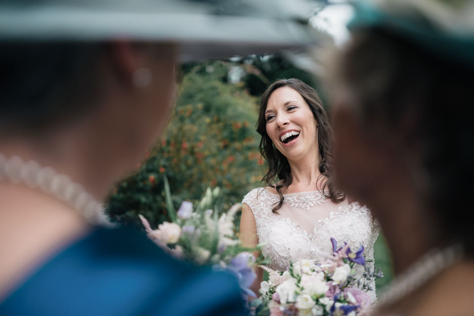 Beautiful Bride laughing at a wedding in Wiltshire