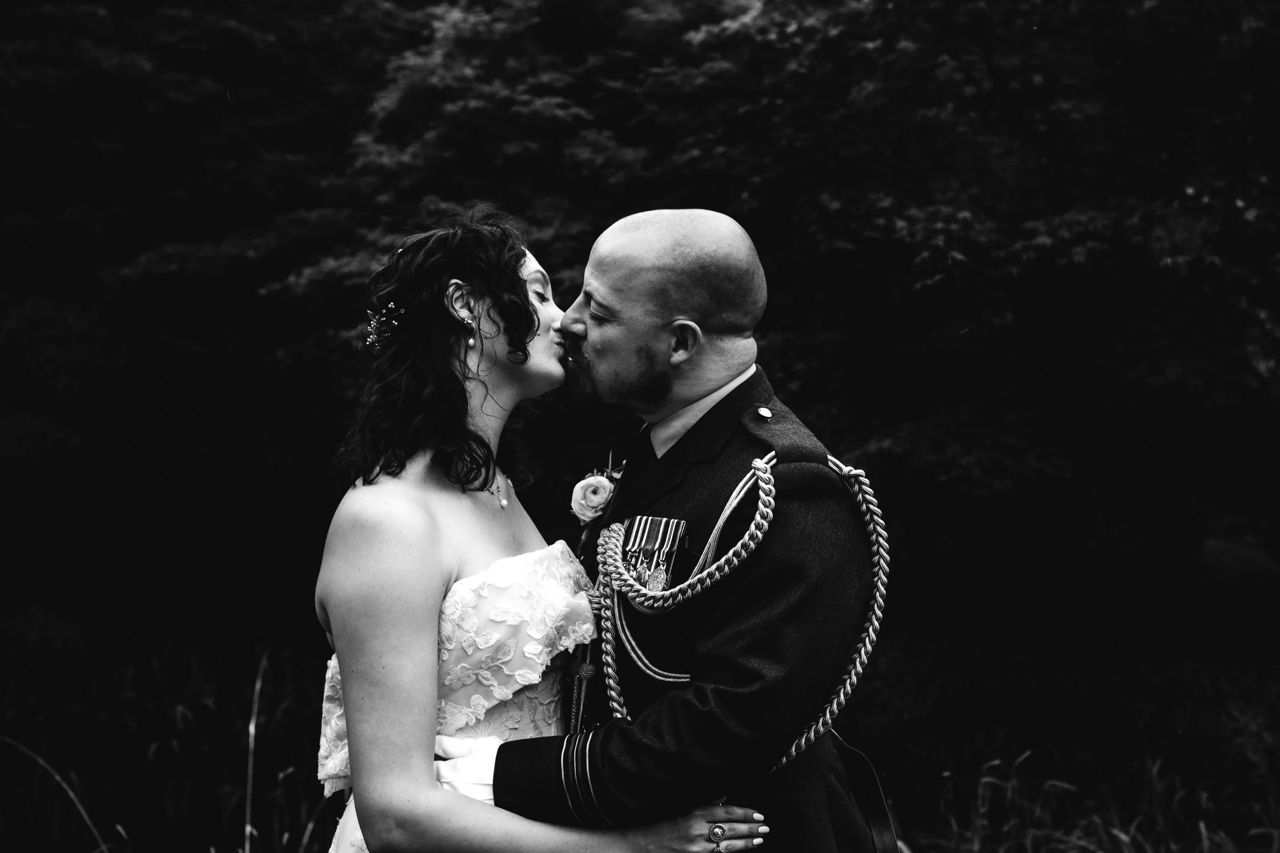 Guyers house weddings - wedding couple share a kiss at Guyers House